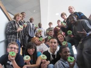Students at the Advanced Technology Center celebrate their certifcations with “green” doughnuts!   