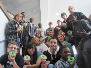 Students at the Advanced Technology Center celebrate their certifcations with “green” doughnuts!