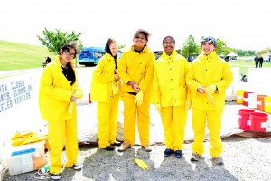 The hardest part about the dumpster dive is donning all the protective equipment. Pictured, left to right: Paola Contieres (Bayside Middle School), Elicial Hasl (Kemps Landing Magnet School), Jasmine Darby (Larkspur Middle School), Berron West (Ocean Lakes High School) and James Hemphill (Ocean Lakes High School). 