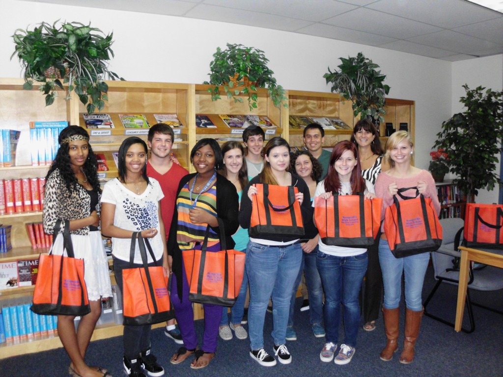 Kempsville High School's S2S program celebrates new transfers. Pictured left to right:  Aysha Rayford; Alyssa Moses; Alex Salvato, president; Savai Williams; Raven Laibstain, vice president; Lars Reitzel; Jasmine Vogt-Avila; Katie Castellano, secretary; Ryan McBride, committee chairman; Cat Brushwood;  Kim Manoso, advisor; and Mary Fischer. 