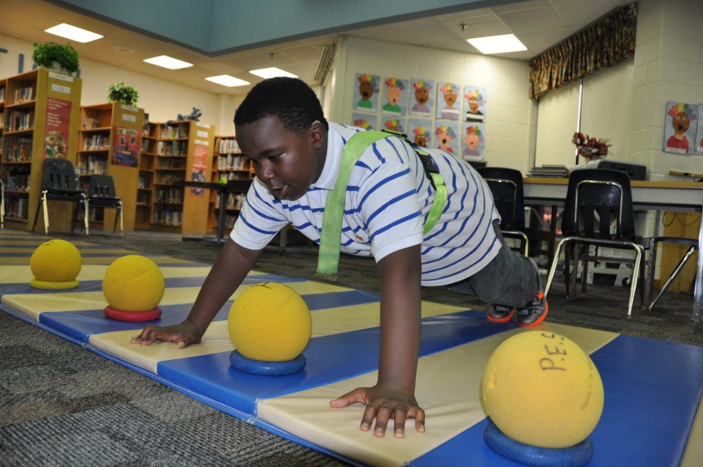 Hezekiah Moore shows off his push-up technique.   