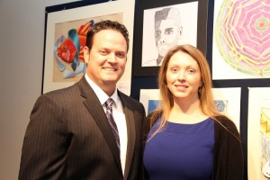 Dr. Aaron Spence, with his wife, Krista, before the Dec. 17 School Board meeting. 