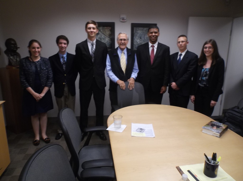 The Foreign Policy Working Group (from left to right) Danielle Spach, Renier Alpiere, Zac Freeman, Sean Lewis, Aaron Kubak and Elizabth Spach meet with Donald Rumsfeld (center). 