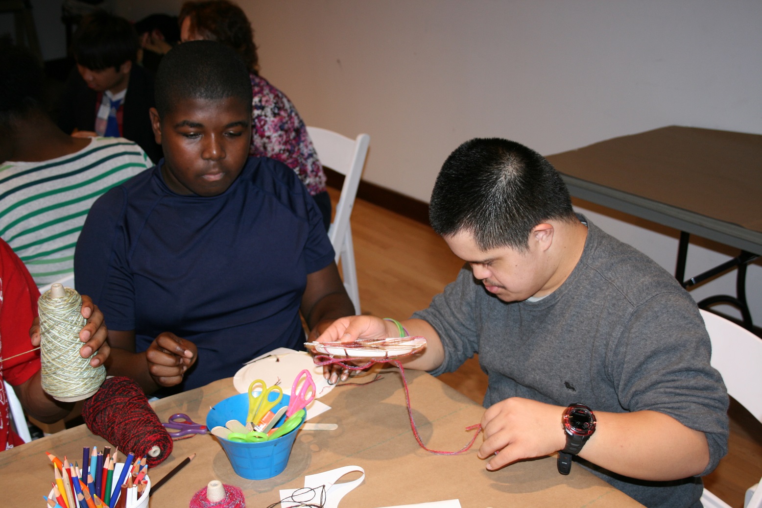 After touring MOCA and seeing artwork by Gabriel Dawes, Salem Middle students create their own designs using thread.