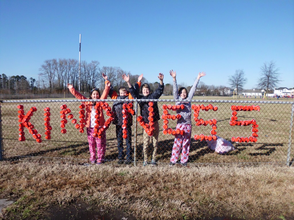 Members of the SCA’s Service Committee at Red Mill Elementary School accepted the Great Kindness Challenge and wanted to share their message with anyone who happens to drive by the school. Pictured here are Emily Vega, Reese Savering, Grant Rose, and Mya Shekitka. 