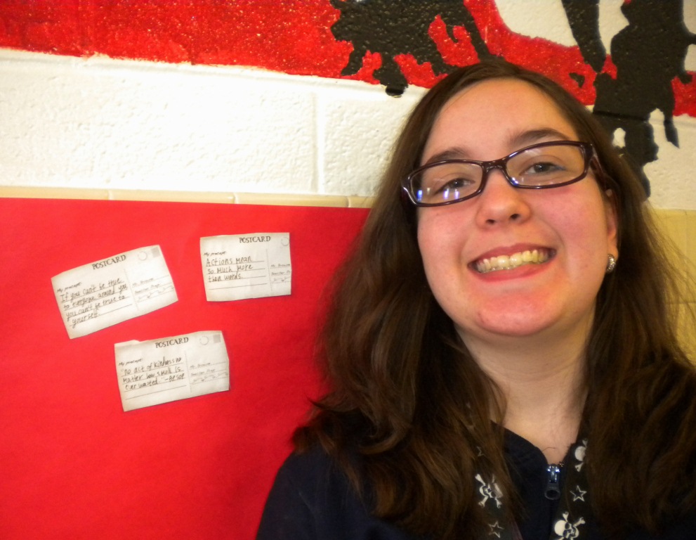 Eighth-grader Monica Fielder posts her three precepts.