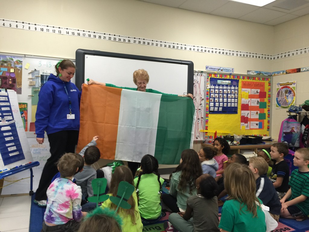 Marianne Winn and Katherine Kelly holding the Ireland flag.