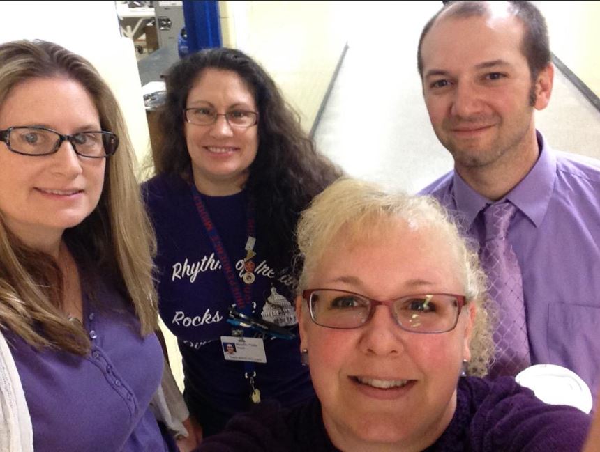 Independence Middle School staff (Jamie Friedman, Michelle Pfeiffer, Deana Hubbell and Andy Filipowicz) show their support for military children in a "purple" selfie.