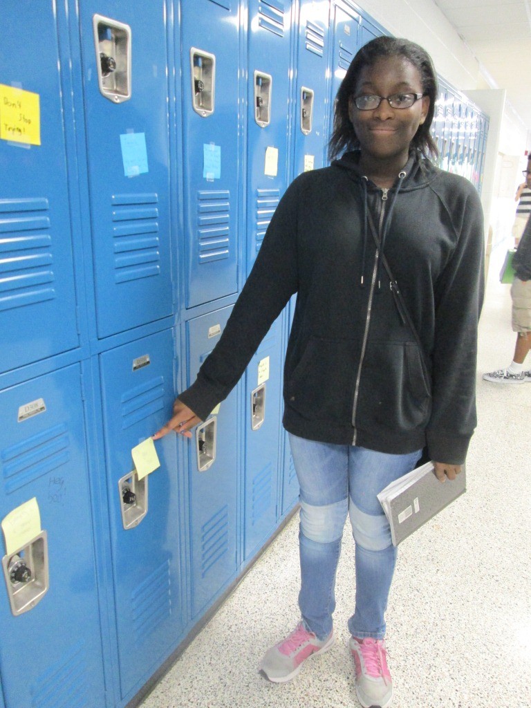 Eighth-grader Shania Banks points to the note left on her locker.
