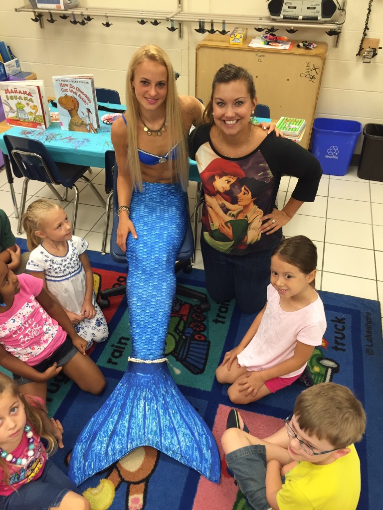 Carmella Karner, Kaniyah Rascoe, Morganne Hill, Mermaid Amanda, Alex Cameron, Ariel Otero and Mason Drumheller enjoyed their reading time together at Windsor Woods Elementary. 